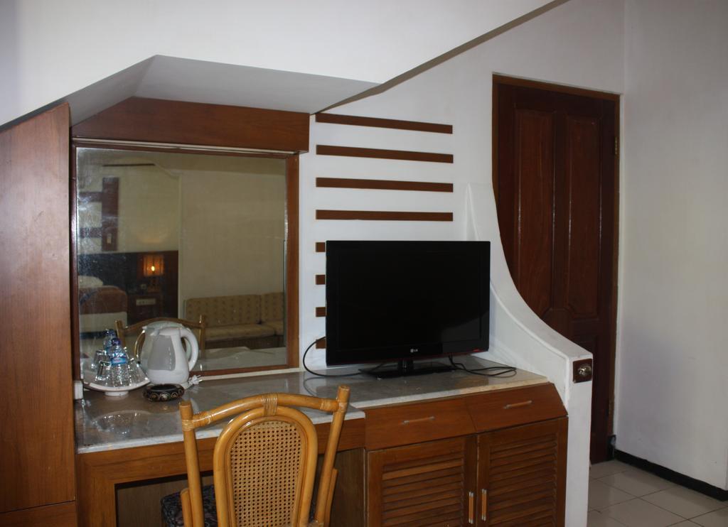 Puri Naga Beachfront Cottages Legian Habitación foto
